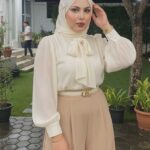 قلبي أسيرٌ بين كلماتكِ